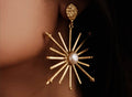 Sun pearl and gold earrings