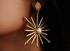 Sun pearl and gold earrings