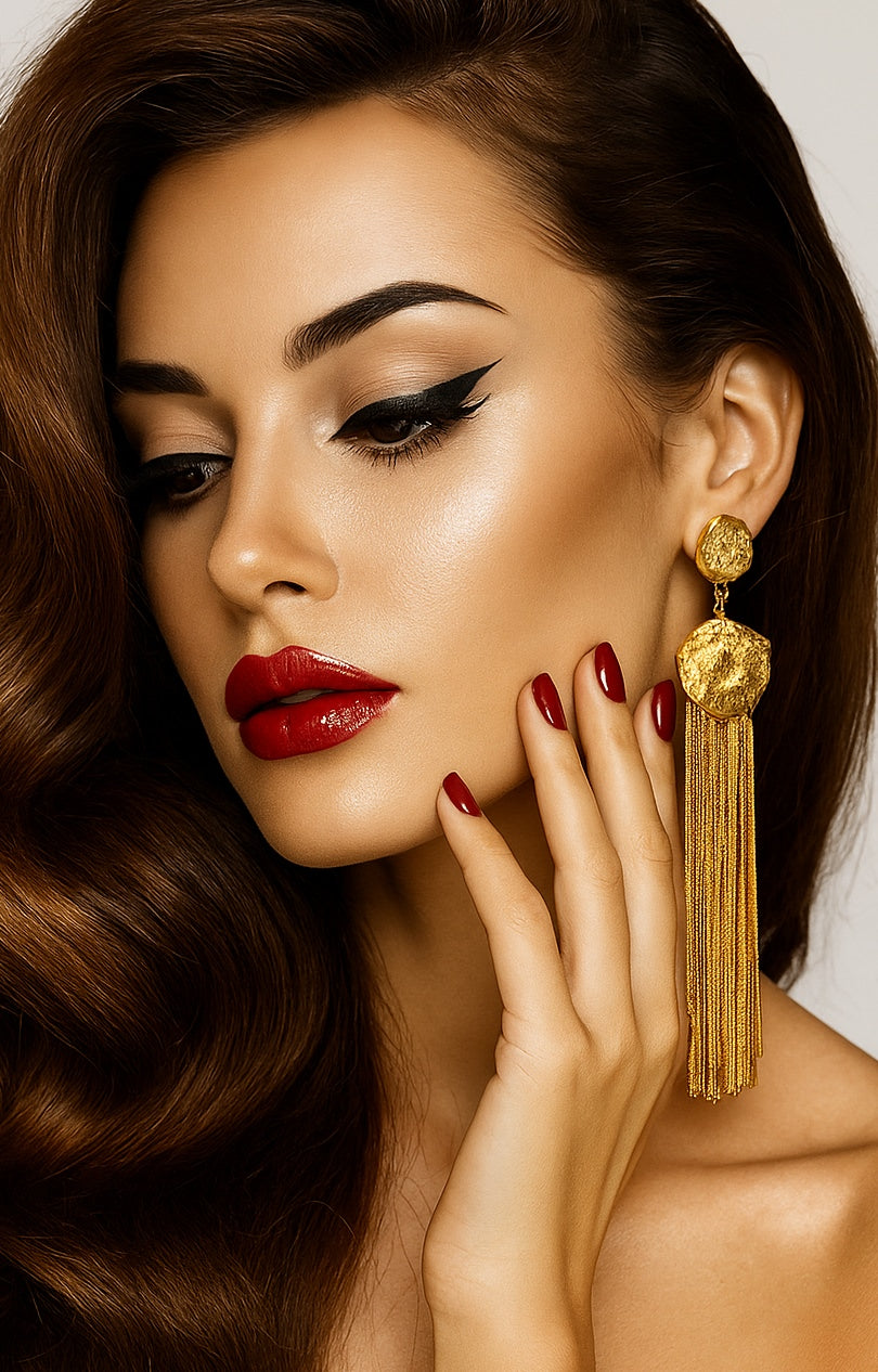 Gold dangler earring