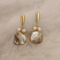 mother of pearl earring Pearl