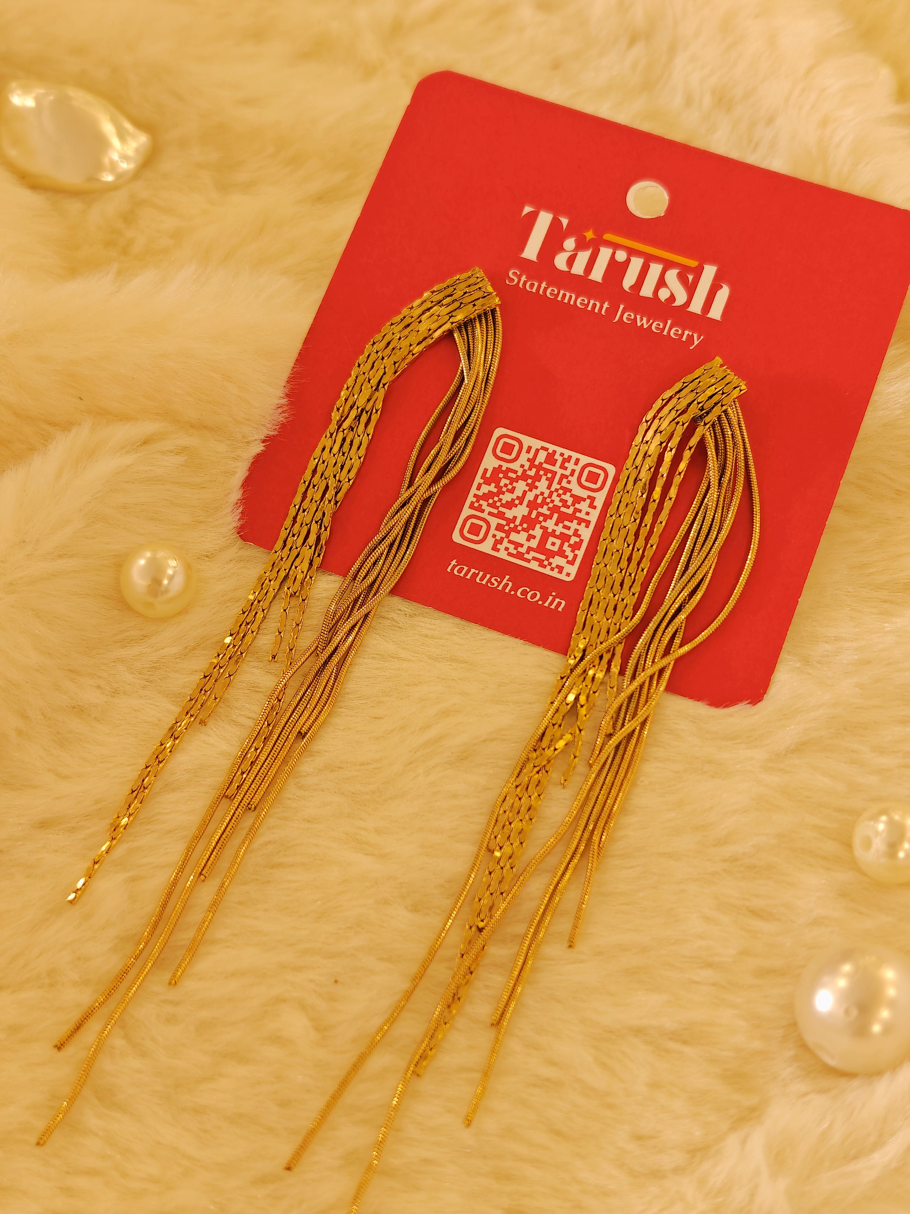 Gold tassel earring