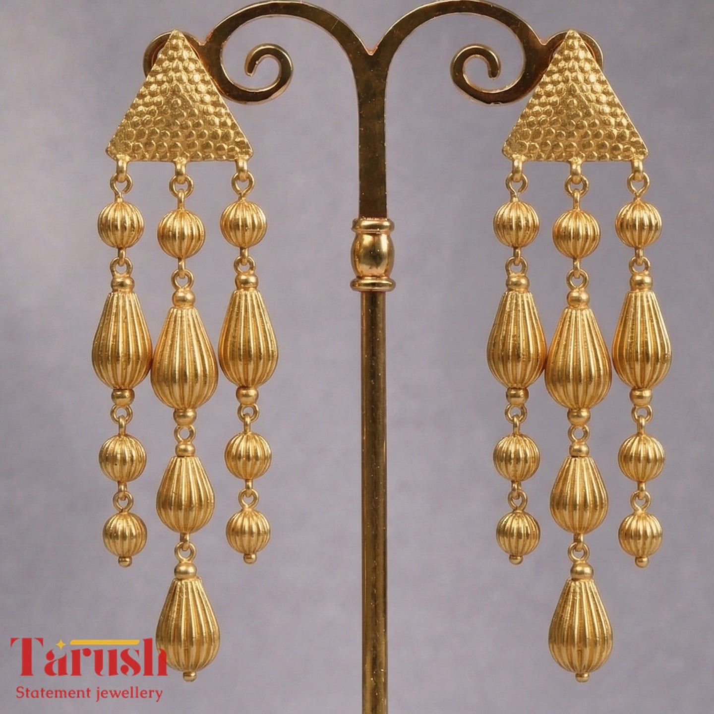 18 Kt Gold Plated Triangle Beaded Jhumka Earrings - Perfect for Your Traditional OutfitsGold - Triangle