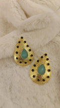 gold with black and green stone earring